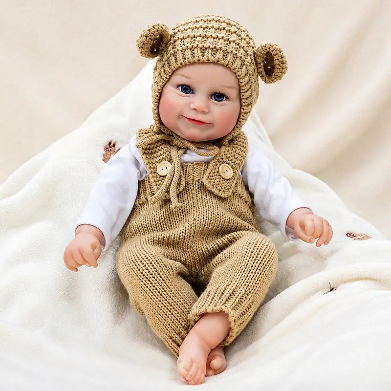 Bear-dressed reborn doll nestled among soft cream blankets for a cozy afternoon indoors.Bear-dressed reborn doll nestled among soft cream blankets for a cozy afternoon indoors.