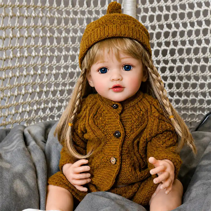 Realistic reborn baby doll crafted with detailed skin tones, carefully painted facial features, and lifelike finishing.