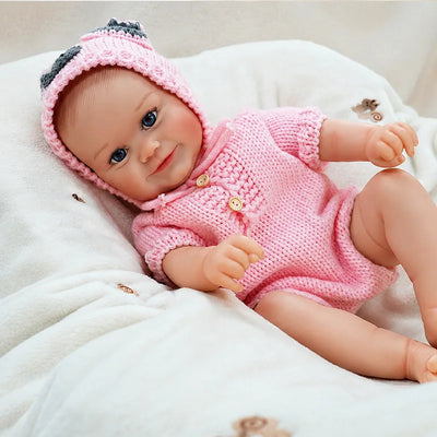 Happy Soft Vinyl Baby Doll with Bright Blue Eyes and an Adorable Expression