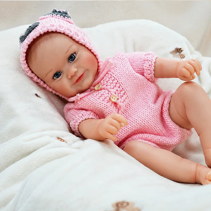 Happy Soft Vinyl Baby Doll with Bright Blue Eyes and an Adorable Expression