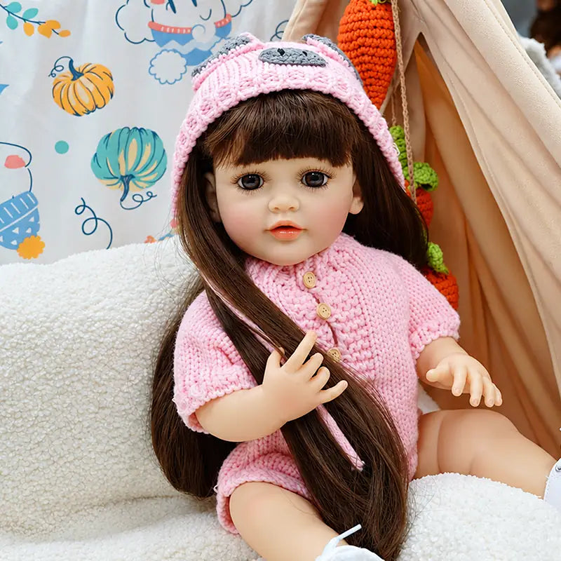 Pink Knit Reborn Baby Doll with Long Brown Hair