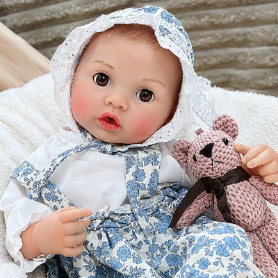 Lifelike baby doll with an open-mouth expression, expressive eyes, tiny fingers, soft-looking limbs, and carefully crafted facial details for interactive feeding fun.