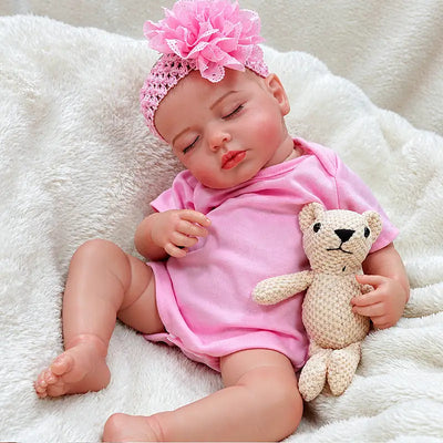 Pink Sleeping Reborn Baby Doll with Hand-Painted Details and Realistic Vinyl Skin