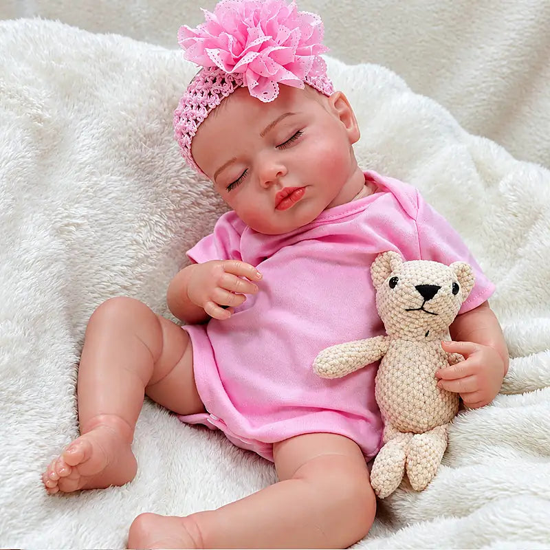 Pink Sleeping Reborn Baby Doll with Hand-Painted Details and Realistic Vinyl Skin