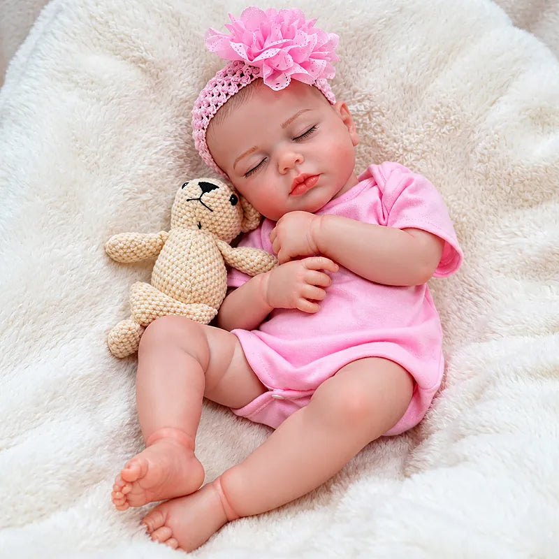 Pink Sleeping Reborn Baby Doll with Realistic Skin Details, Soft Vinyl Craftsmanship and a Cuddly Teddy Bear for Kids and Doll Collectors