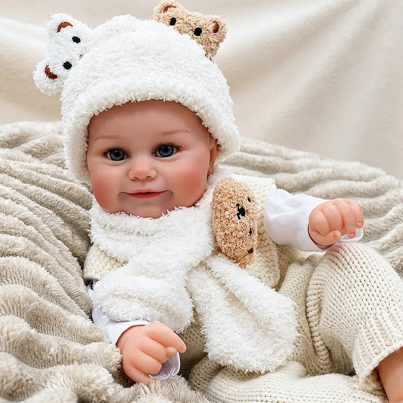Realistic Baby Doll Relaxing on a Soft Blanket for Cozy Playtime