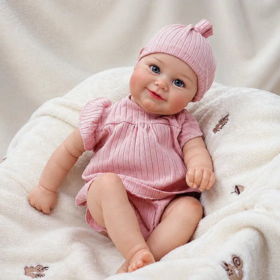 Eliza’s bright blue eyes, delicate eyelashes, softly blushed cheeks, and gently smiling pink lips.