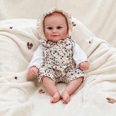 Blue-eyed baby doll with a cheerful expression, bare feet and a vintage-inspired floral outfit.