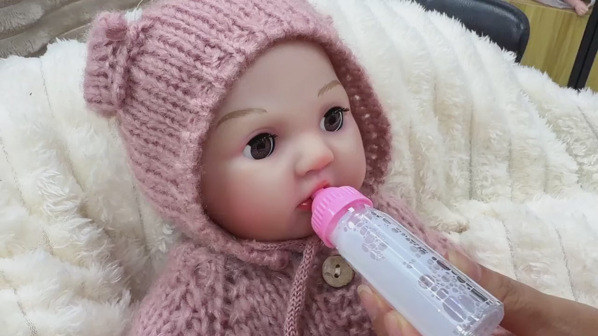 Load video: Feedingrebornbabydoll