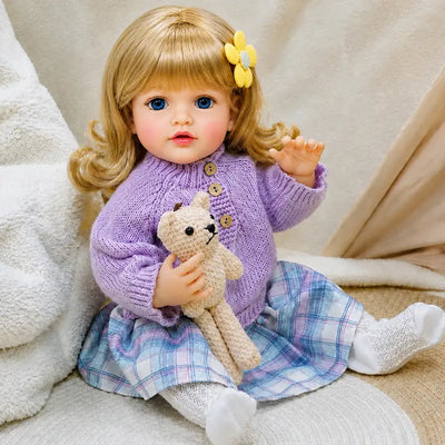 Realistic reborn doll designed with finely detailed skin texture, carefully painted facial features, natural blush tones, and lifelike baby proportions.