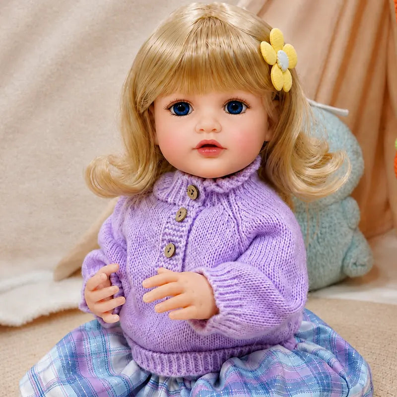 Realistic baby doll with teddy bear companion, perfect for nursery role-play, storytelling, tea parties, dress-up games, and imaginative family play.