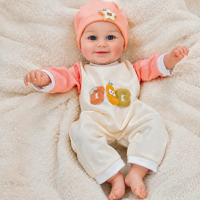 Lifelike reborn baby doll featuring realistic facial details, natural blushing, delicate lips, expressive blue eyes, and tiny sculpted hands and feet.