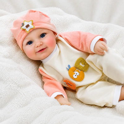 Realistic reborn baby doll crafted with detailed sculpting, layered skin-tone coloring, subtle blush effects, and finely finished facial features for a lifelike appearance.