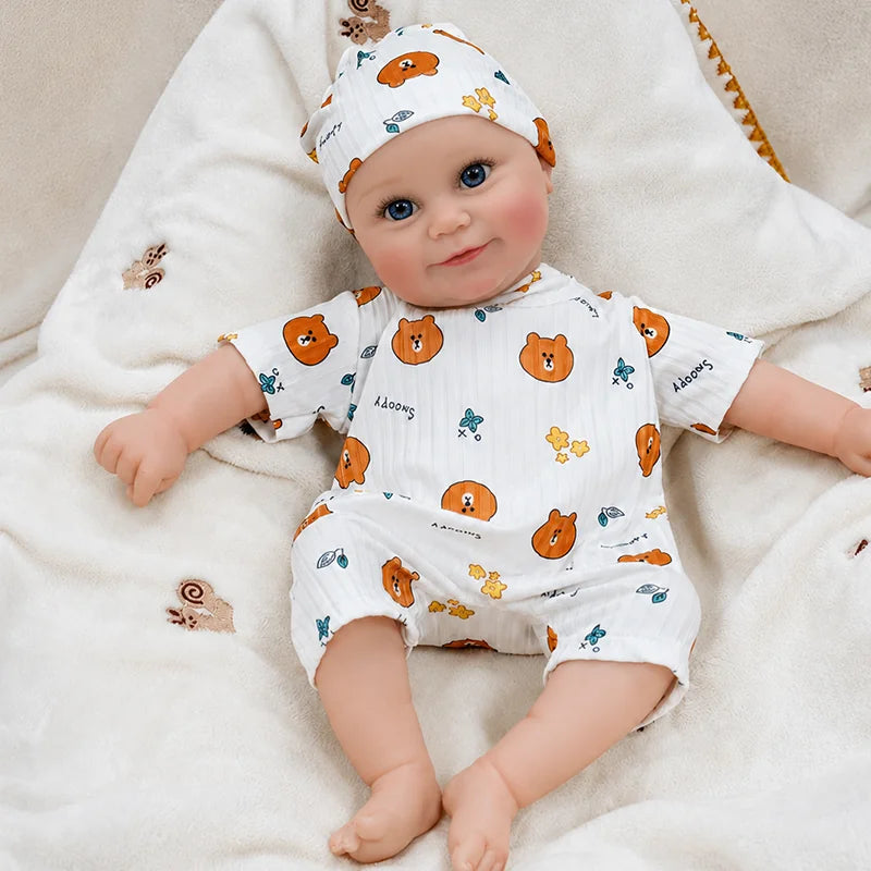 Lifelike baby doll crafted with realistic facial coloring, carefully defined features, smooth skin texture, and finely detailed eyes and lashes.